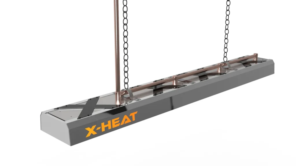a Nano-Heat²⁴ ceiling heater on a white background., it is fully black 4 X's along the top of the heater. On the left side of the heater there is an orange X-HEAT logo in all caps. Along the top there are copper pipes that go into the heater, at the end of the pipe it goes up to the ceiling, there are chains that help to hold it up aswell.